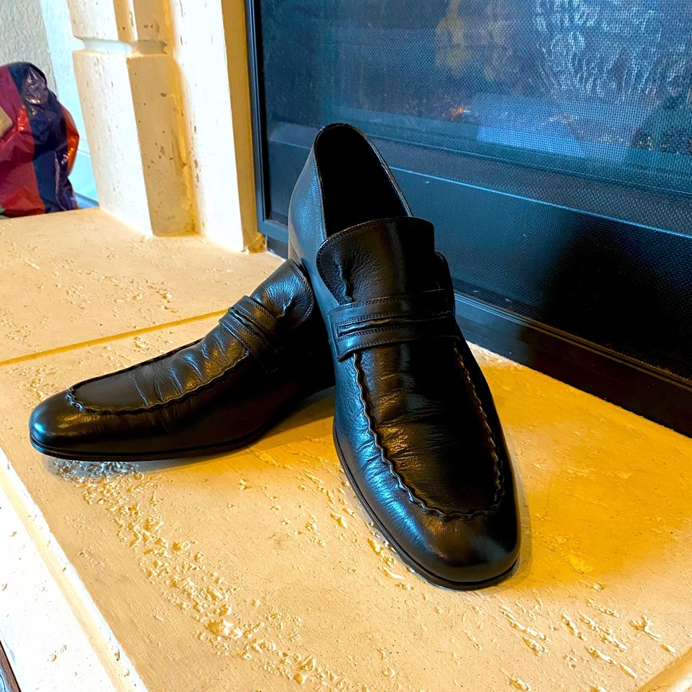 Black Gucci loafers